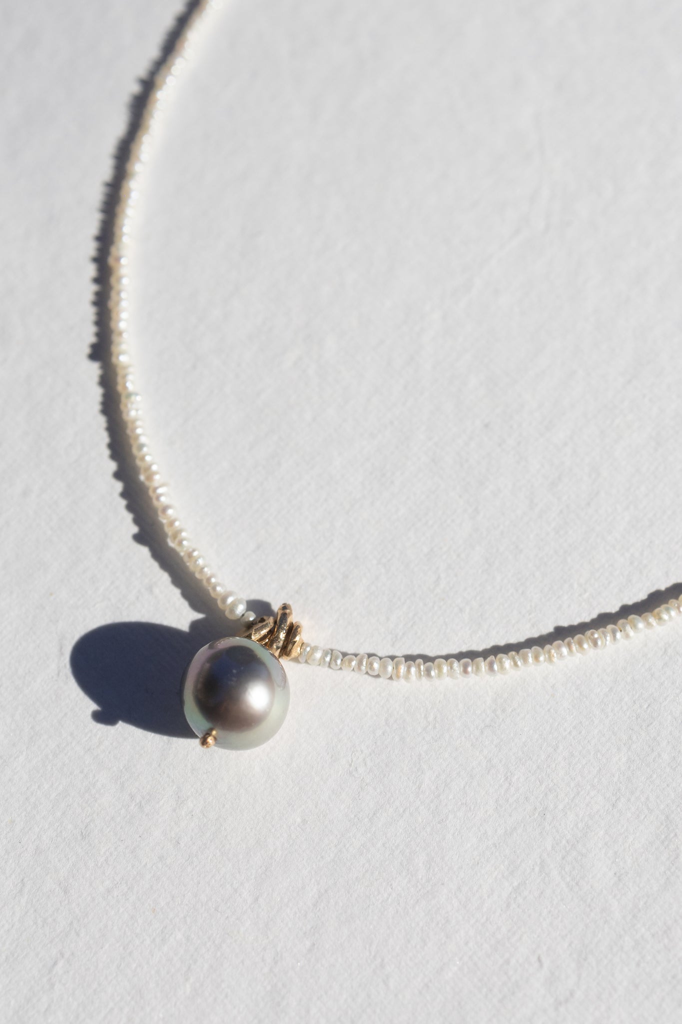 Seed Pearls with Tahitian Pearl & Casted Beads